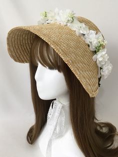 Step into timeless elegance with our floral design straw bonnet, available in three enchanting colors: pink, white, and wine red. Handcrafted with meticulous attention to detail, this bonnet features a delicate floral design that exudes a vintage charm, perfect for Lolita and Kawaii fashion enthusiasts. White Elegant Straw Hat, Elegant White Straw Hat, Elegant Spring Bonnet, Elegant Fitted Summer Bonnet, Straw Hats For Spring Weddings, Elegant Cream Bonnet For Spring, Elegant Adjustable Summer Bonnet, Elegant Bonnet For Spring, Elegant Adjustable Bonnet For Summer