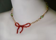 This one of a kind red and green beaded necklace is handmade from upcycled antique Czech beads, including stunning floral cloisonné, baroque pearls, and at least 100 y. o. red seed beads. Beads actually belonged to my spouse's grandmother! If you look closely, none of a seed beads are alike.  This fairy style collar can become a heirloom item, because there's no other one like that in the whole world! Best gift to a cottagecore style lover!  Sustainable jewelry that was made with a concern about Red Whimsical Jewelry For Gift, Whimsical Red Jewelry For Gift, Whimsical Red Jewelry For A Gift, Red Necklaces With Bead Caps For Gifts, Fairycore Beaded Jewelry Gift, Red Jewelry With Bead Caps For Gift, Vintage Beaded Necklace With Spacer Beads As A Gift, Handmade Red Beaded Necklaces For Christmas, Red Bohemian Jewelry For Christmas