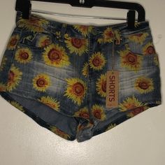 Rue 21 Sunflower Shorts Jeans Completely New With Tag Size: 5/6 About S Condition: New With Tags Summer Printed Cotton Shorts, Blue Printed Bottoms For Summer, Multicolor Floral Print Bottoms For Summer, Multicolor Floral Print Summer Bottoms, Summer Floral Print Multicolor Bottoms, Floral Print High-waisted Shorts For Beach, Summer Printed Shorts, Fitted Summer Jean Shorts, Multicolor Floral Print Shorts For Beach Season