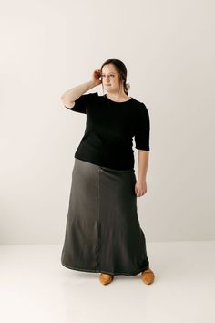 With the look of real denim but the feel of a quality knit, comfort is the key element in our exclusively designed Caroline skirt. The quick, pull on style makes this skirt an effortless option for wherever your day might take you - running errands, making dinner, playing with the kids, or a quick trip to the coffee shop to grab your favorite latte. Soft, comfortable knit denim fabric 65% Cotton 30% Polyester 5% Spandex Wash on gentle cycle in cold water, Hang to dry Fabric covered elastic waist Casual Stretch Skirt For Layering, Casual Long Stretch Denim Skirt, Casual Stretch Long Denim Skirt, Casual Fitted Everyday Skirt, Casual Skirt For Layering, Casual Fitted Skirt For Everyday, Everyday Fall Lined Skirt, Casual Skirt Bottoms For Layering, Modest Fitted Bottoms For Fall