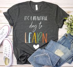 a t - shirt that says it's a beautiful day to learn