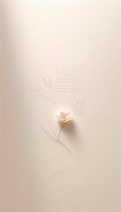 a wedding card with a single flower on it