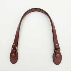 "This listing is for ONE pair of 23.5\" inch sew-in PU leather bag handles for bag making (Two single straps).  The bag handles come with sewing holes on the attachment tap. Size specification: Length: Approximately 23.5\" / 60cm Strap Width: 2cm Strap end (attachment tap): 6.7cm (L) x 4cm (W) Material: PU Leather / Faux Leather with bronze colour metal hardware Colour: Wine Red Any questions, please send us a convo or email us at hello@purple-stitches.com Thank you very much. ** UK CUSTOMER - I Sewing Holes, Bronze Colour, Longchamp Bag, Pu Leather Bag, Purse Handles, Handbag Handles, Handbag Straps, Bag Handle, Womens Purses