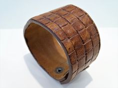 Fantastic handmade Embossed leather bracelet with square patterns, Brown Leather Cuff Bracelet, Nice women gefy, Brown wrist cuff, Men Bracelet,Bikers Bracelet Brown Leather Rectangular Bracelet, Brown Rectangular Leather Strap Bracelet, Adjustable Leather Rectangular Wristband, Adjustable Rectangular Leather Wristband, Rectangular Leather Bracelets, Rectangular Brown Cuff Bracelet Gift, Biker Bracelet, Nice Women, Leather Cuff Bracelet