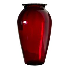 a large red vase is shown on a white background for use as an accent piece