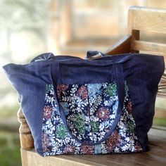 Indonesian artisan Susan designs this lovely tote bag. Handmade from 100% cotton the navy bag features a floral pattern that is hand-stamped using the batik technique. On the outside of the bag are two pockets one velcro and one zippered. The inside of the bag has a light blue cotton lining and one zip pocket. Navy Cotton Tote Bag, Indigo Cotton Rectangular Bag, Indigo Cotton Bag For Everyday Use, Everyday Indigo Cotton Bag, Batik Technique, Trend Ideas, Blue Leather Wallet, Pack Up And Go, Style Inspiration Classic