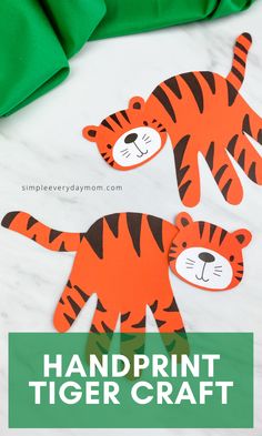 two handprint tiger crafts with the title overlay