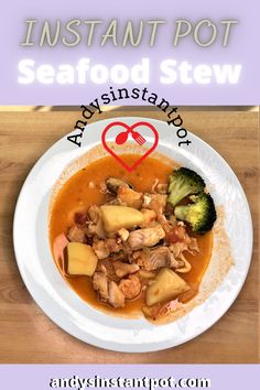 the instant pot seafood stew is ready to be eaten with broccoli and potatoes