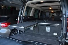 the back end of a van with its cargo compartment open