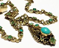 VERY beautiful, substantial and rare authentic Vintage Austro Hungarian sterling silver gold gilt Turquoise, enamel and pearls necklace! please see photos as part of description. it is in great vintage condition - in great clean condition and can be worn/gifted immediately- comes in a gift box. it is probably was not worn much because the gold gilt all present and the enamel in very very good condition! tested to be approx 800-925 silver with yellow gold gilt over. smoke free environment! fast s Victorian Hallmarked Turquoise Jewelry, Victorian Turquoise Hallmarked Jewelry, Ornate Turquoise Jewelry For Collectors, Antique Green Jeweled Necklace, Antique Green Jeweled Necklaces, Victorian Turquoise Necklace For Wedding, Antique Turquoise Pendant Necklace, Victorian Turquoise Filigree Jewelry, Antique Jeweled Collectible Necklace