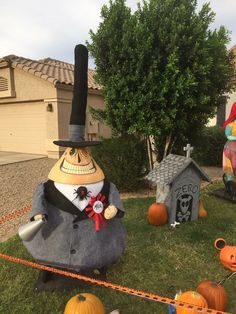 an inflatable scarecrow and other halloween decorations