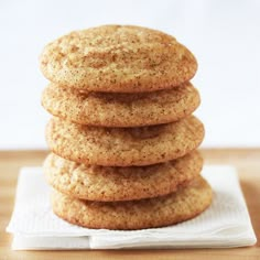 a stack of cookies sitting on top of a white napkin