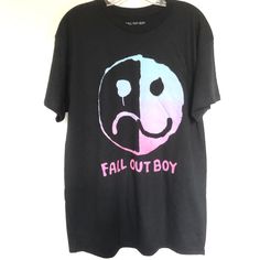 Fall Out Boy Black Band T Shirt Fall Out Boy Band T-Shirt Featuring A Front Smiley Face Graphic Soft Cotton Cut In A Relaxed Fit With Short Sleeves Crew Neck. - 100% Cotton, - New - Large - Chest: 22” - Length 31” Fall Out Boy Black T Shirt Black Grunge T-shirt For Fall, Black Emo T-shirt For Fall, Black Punk T-shirt For Fall, Black Graphic T-shirt For Fall, Emo Black T-shirt With Graphic Design, Emo Style Fall T-shirt For Streetwear, Black Edgy Shirt With Text Print, Edgy Black Shirt With Text Print, Black Cotton Emo T-shirt