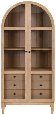 an arched wooden bookcase with drawers on the front and bottom shelves in light wood