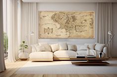 a living room filled with furniture and a large map hanging on the wall above it