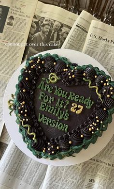 a heart shaped cake sitting on top of a table