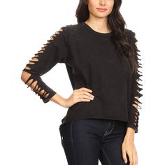 The Anna-Kaci Women's Distressed Long Sleeve Top with Cut-Out Details and Raw Hem is a trendy and edgy addition to your casual wardrobe. Made from soft, comfortable fabric, this top features intentional distressing and cut-out details that add a unique, grunge-inspired flair. The raw hemline enhances the casual, laid-back vibe, making it perfect for everyday wear. Whether you're pairing it with jeans, leggings, or shorts, this long sleeve top offers a relaxed fit that is both stylish and comfort Trendy Ripped Tops For Night Out, Edgy Ripped Tops For Fall, Distressed Tops For Spring Night Out, Distressed Tops For Night Out In Spring, Trendy Distressed Tops For Night Out, Trendy Black Ripped Tops, Edgy Ripped Tops For Night Out, Black Distressed Long Sleeve Tops, Ripped Grunge Tops For Fall