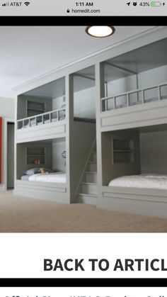 an image of a bedroom with bunk beds on the bottom floor and stairs up to the second floor