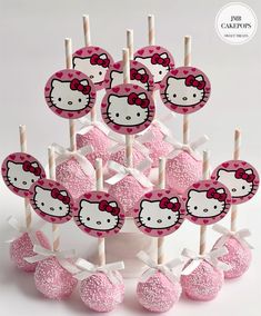 hello kitty lollipops are arranged on sticks