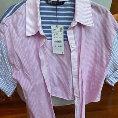 Zara Medium Combination Striped Crop Shirt Button Front Short Sleeve Tie Front Brand New W Tag!! Size Medium Article No- 2904/678/046 Brand - Zara Color - Pink Garment Care -Machine Washable Type -Button-Up Closure Tie Sleeve Length -Short Sleeve Material -100% Cotton Season - Spring, Summer Size - M Neckline -Collared Occasion -Casual, Party/Cocktail, Travel Style - Cropped Fit -Classic Pattern -Striped Make Me An Offer! If You Have Any Questions, Please Feel Free To Ask! :) Pink Collared Zara Top, Zara Pink Collared Tops, Zara Pink Tops With Buttons, Zara Pink Shirt For Work, Zara Pink Button-up Top, Zara Pink Cotton Shirt, Pink Zara Shirt For Spring, Pink Cotton Zara Shirt, Zara Pink Button-up Blouse