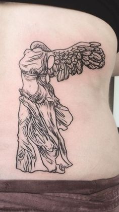 a woman's stomach with an angel tattoo on her belly and the back of her body