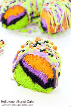 a colorful cake with sprinkles and candy on it