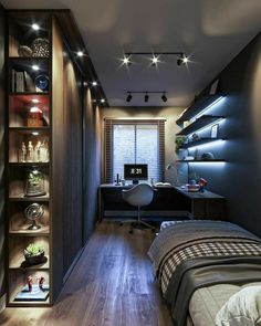 a bedroom with wooden floors and built in shelves