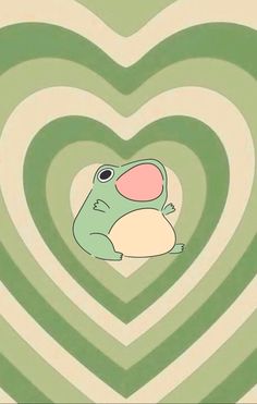 a green frog sitting in front of a heart