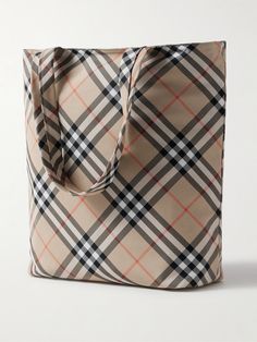 Burberry's spacious tote bag is a practical choice for every day. In the label's iconic check, it's made from durable twill and appliquéd with a matching 'EKD' ('Equestrian Knight Design') that symbolises honour, protection and reform. It's sized for spare clothes, a tablet and water bottle. Tote Bag For Men, Limousine Car, Knight Design, Burberry Accessories, Summer Sunglasses, Fine Jewelry Designers, Loungewear Shorts, Luxury Gifts, Mr Porter