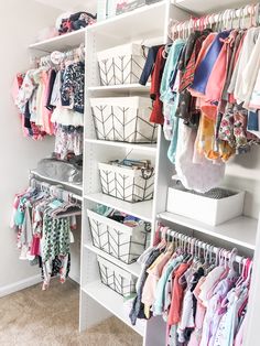 the closet is full of baby clothes and other things to put in it's bins