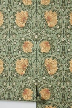 an old wallpaper with flowers and vines on green background, in the style of art nouveauism