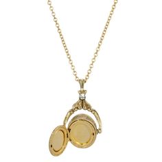 A style popularized by Queen Victoria, this locket spinner necklace features a simulated carnelian and ivory colored cameo set on an etched gold-tone frame. This locket holds a keepsake close and adds a beautiful vintage feel to any ensemble. A style popularized by Queen Victoria, this locket spinner necklace features a simulated carnelian and ivory colored cameo set on an etched gold-tone frame. This locket holds a keepsake close and adds a beautiful vintage feel to any ensemble. Drop length: 1 Gold Necklaces With Detachable Pendant For Collectors, Collectible Gold Jewelry With Detachable Pendant, Antique Gold Jewelry With Detachable Pendant, Antique Gold Necklace With Vintage Charm For Keepsake, Antique Style Yellow Gold Medallion Locket Necklace, Antique Yellow Gold Medallion Locket Necklace, Elegant Gold Cameo Locket Necklace, Gold-tone Round Pendant Locket Jewelry, Gold-tone Round Pendant Locket