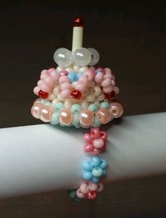 a close up of a bracelet with beads on it