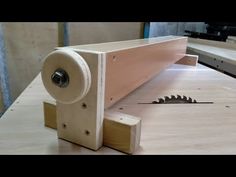 a piece of wood is being made with a circular sawtoothing tool on the table