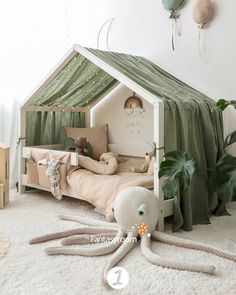 an image of a child's bedroom with octopus toys