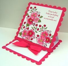 a card with pink flowers on it