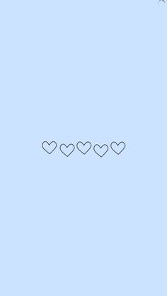 hearts are arranged in the shape of three lines on a light blue background with black dots