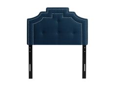 an upholstered headboard with studding on the top and bottom, in dark blue