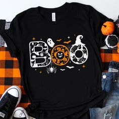 Buy Boo Spiders Ghosts Pumpkin Witch Hat Halloween Shirt at Fantasywears. Hight quality products with perfect design is available in a spectrum of colors and sizes, and many different types of shirts! Unisex T-Shirt – 100% Cotton (fiber content may vary for different colors) – Medium fabric (5.3 oz/yd² (180 g/m²)) – Classic fit – Tear away the label – Runs true to size Women T-Shirt – 100% combed ringspun cotton (fiber content may vary for different colors) – Light fabric (4.3 oz/yd² (146 g/m²)) – Slim fit with a longer body length – Tear away the label – Runs [...] Black Shirt With Sublimation Print For Halloween, Themed Black T-shirt With Letter Print, Black Themed T-shirt With Funny Print, Themed Black T-shirt With Funny Print, Pumpkin Witch Hat, Witch Hat Halloween, Pumpkin Witch, Ghost Pumpkin, Halloween Boo