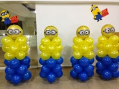 some balloons are arranged in the shape of minion characters