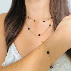 The black bead necklace is elegant, simple, and beautiful to wear daily. This necklace is an excellent gift for a woman who loves jewelry and needs something easy to pull on with any outfit! We also have the matching pulse in case you would like the Set; I will leave the link below. Material: 18k Gold Filled -16, 18, and 20-inches necklace  -4 mm wide -Perfect for all time. -High-quality Chain.  FAST & FREE SHIPPING! Our handmade products are rated very highly by our customers. We work hard with Elegant Double Strand Beaded Necklace With Black Beads, Elegant Black Crystal Necklace With Beaded Chain, Elegant Black Beaded Necklace For Everyday, Elegant Crystal Necklace With Black Beads For Gift, Elegant Black Beaded Crystal Necklace For Gift, Black Beaded Necklaces For Everyday, Elegant Black Beaded Necklace With Tiny Beads, Dainty Black Beaded Chain Necklace, Dainty Black Beaded Necklace With Round Beads