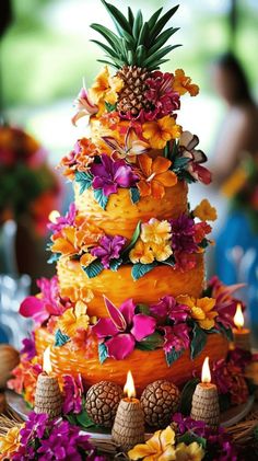 a pineapple cake with flowers and pine cones on the top is surrounded by candles