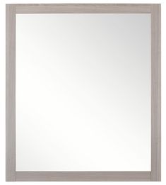 a white framed mirror sitting on top of a wall