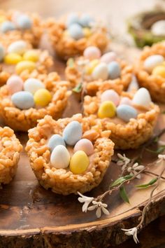 some cookies with candy eggs in them on a table