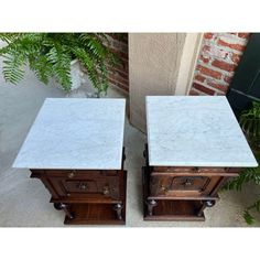 pair of marble top end tables