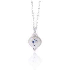 Evocative of falling raindrops, this pendant features a lovely array of blue sapphires and aquamarines with diamond accents. Set in sterling silver to accentuate the cool tones of the stones. Sterling Silver Blue Sapphire Aquamarine Diamond 16-18" Adjustable Sterling Silver Chain Satin Finish Style sc506-3 Blue Drop Jewelry With Diamond Accents, Sapphire Drop Gemstone Necklace, Sapphire Gemstone Drop Necklaces, Sapphire Drop Necklace With Gemstone, Blue Diamond Briolette Necklace, Luxury Sapphire And Diamond Necklace In Silver, Blue Sapphire Pendant Diamond Necklace, Luxury Sapphire Drop Jewelry, Fine Jewelry Sapphire Drop Necklace