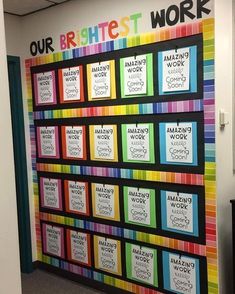 a colorful bulletin board on the wall in an office cubicle that says our brightest work