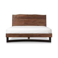 the bed frame is made from wood and has white sheets