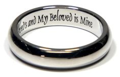 a ring with the words jesus and my beloved is mine on it