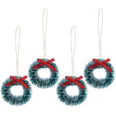 three christmas wreath ornaments hanging from twine